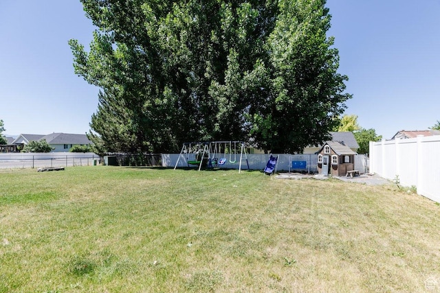 287 S 375 W, Providence, UT 84332 - view of yard featuring an outdoor structure and a playground