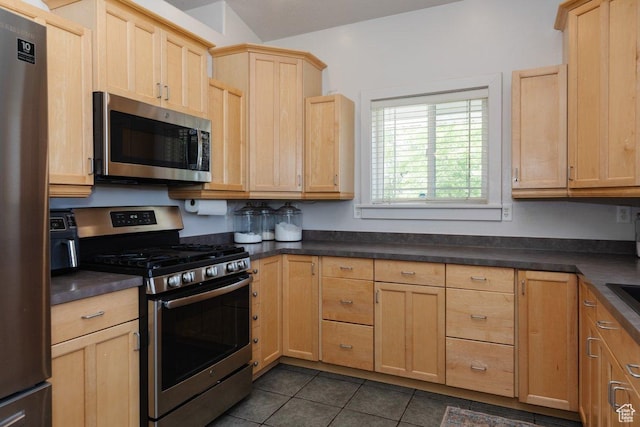287 S 375 W, Providence, UT 84332 - kitchen with light brown cabinetry, dark tile patterned floors, and appliances with stainless steel finishes