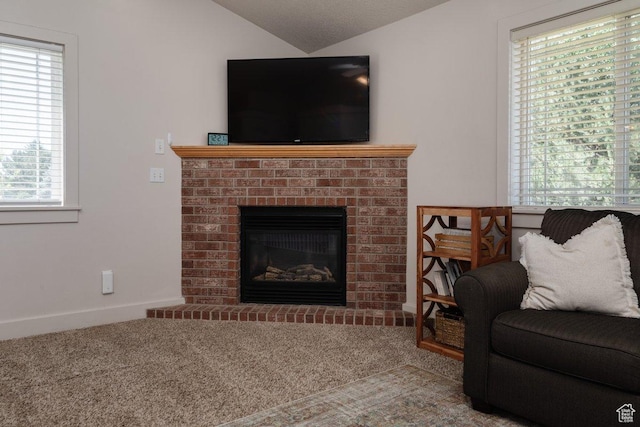287 S 375 W, Providence, UT 84332 - carpeted living room with plenty of natural light, a fireplace, and vaulted ceiling