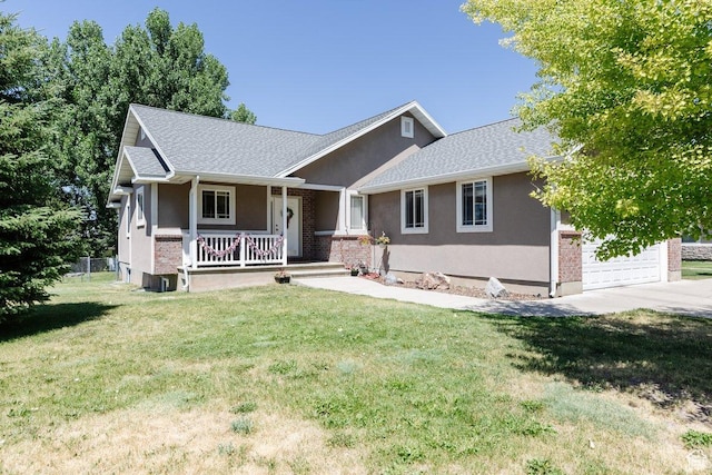 287 S 375 W, Providence, UT 84332 - view of front of property with covered porch and a front lawn