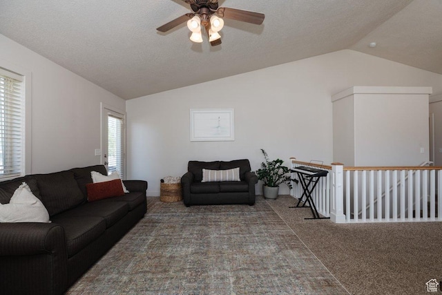 287 S 375 W, Providence, UT 84332 - living room featuring ceiling fan, carpet floors, a textured ceiling, and vaulted ceiling