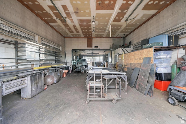 513 W Lake St, Ogden, UT 84401 - miscellaneous room featuring a workshop area and concrete flooring