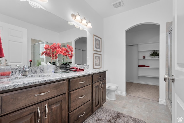 649 E 5650 S, Washington Terrace, UT 84405 - bathroom with vanity, toilet, and walk in shower