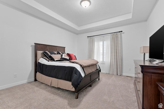 649 E 5650 S, Washington Terrace, UT 84405 - carpeted bedroom featuring a tray ceiling