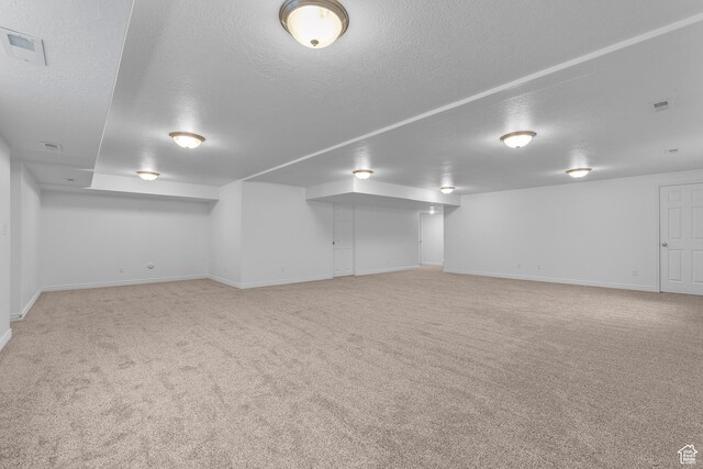 649 E 5650 S, Washington Terrace, UT 84405 - basement featuring a textured ceiling and carpet floors