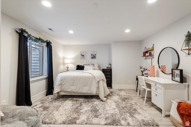 bedroom featuring light hardwood / wood-style floors