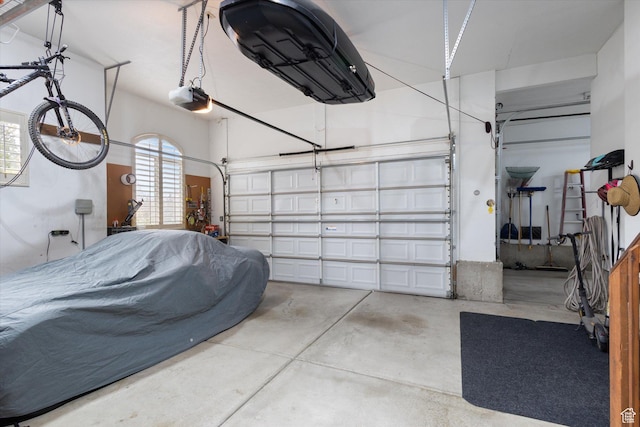 garage featuring a garage door opener