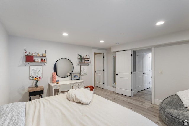 bedroom with light wood-type flooring