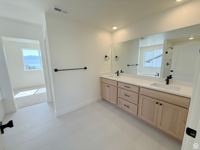 3241 S Red Wolf Dr, Saratoga Springs, UT 84045 - full bathroom featuring double vanity, baseboards, and recessed lighting