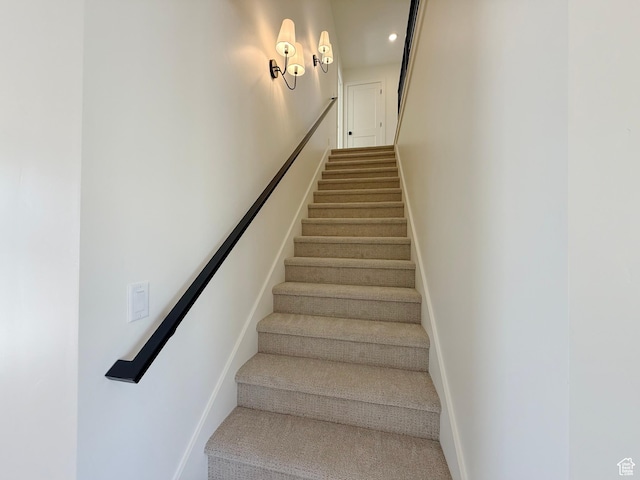 3241 S Red Wolf Dr, Saratoga Springs, UT 84045 - stairway featuring baseboards, recessed lighting, and carpet floors