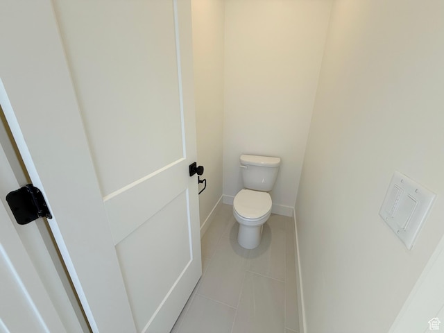 3241 S Red Wolf Dr, Saratoga Springs, UT 84045 - bathroom with baseboards, toilet, and tile patterned floors