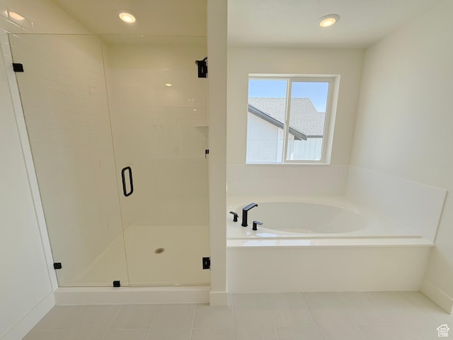 3241 S Red Wolf Dr, Saratoga Springs, UT 84045 - bathroom featuring a garden tub, a stall shower, tile patterned floors, recessed lighting, and baseboards