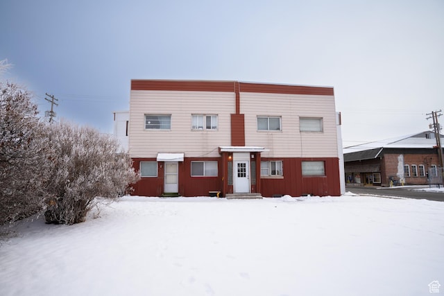 128 N 8th St, Montpelier, ID 83254 - view of snow covered house