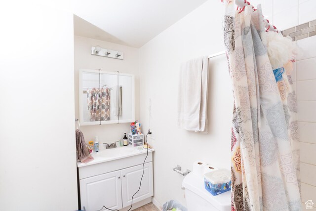 128 N 8th St, Montpelier, ID 83254 - full bath with toilet, vanity, and curtained shower