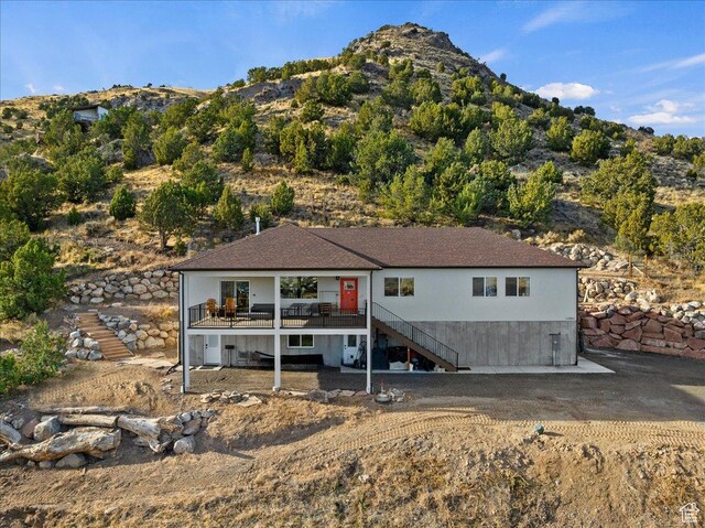 13802 S Mount Shaggy Dr, Herriman, UT 84096 - view of front facade with a deck with mountain view