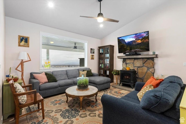 13802 S Mount Shaggy Dr, Herriman, UT 84096 - living room with wood-type flooring, vaulted ceiling, and a wood stove