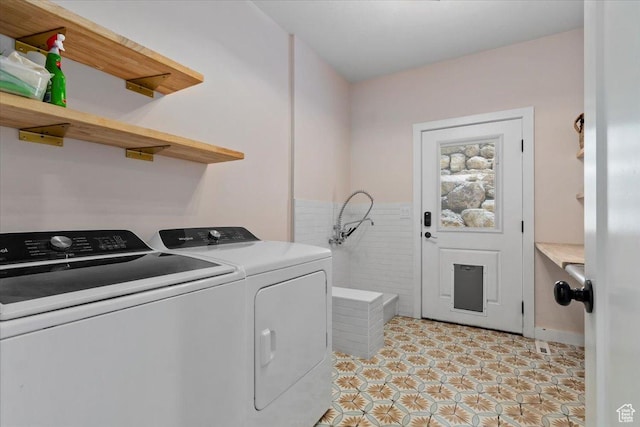 13802 S Mount Shaggy Dr, Herriman, UT 84096 - clothes washing area with separate washer and dryer and tile walls