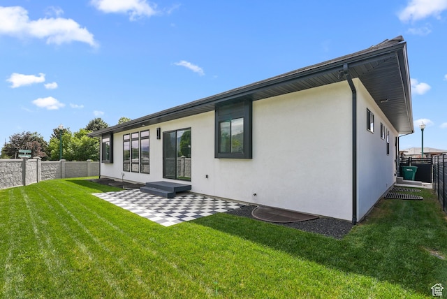 1302 N 750 E, Orem, UT 84097 - rear view of house featuring a patio area and stucco siding
