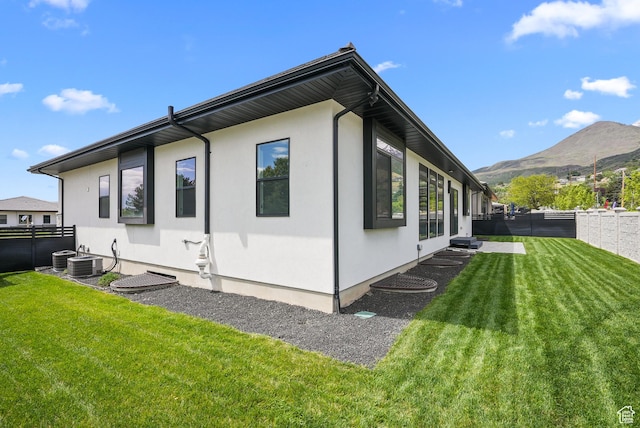 1302 N 750 E, Orem, UT 84097 - view of side of property featuring a mountain view and central air condition unit
