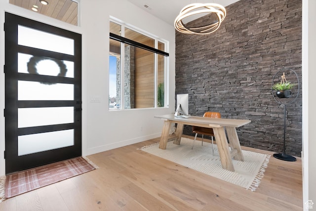 foyer entrance with wood-type flooring