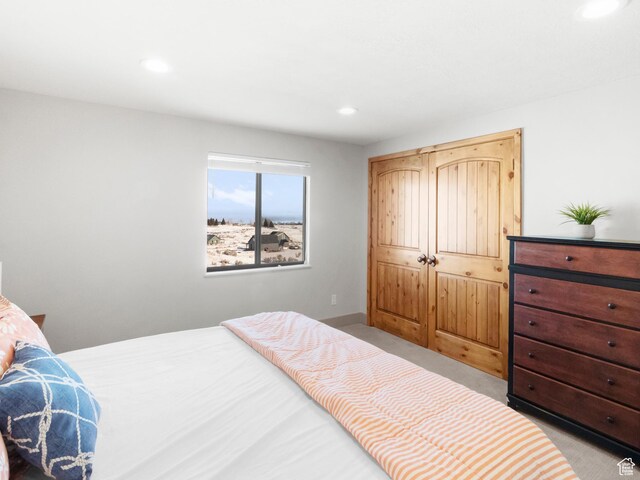 3092 S Country Club Way, Garden City, UT 84028 - bedroom featuring baseboards, recessed lighting, and carpet