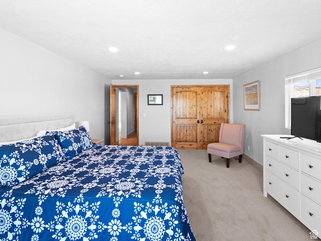 3092 S Country Club Way, Garden City, UT 84028 - bedroom featuring recessed lighting, visible vents, light colored carpet, and baseboards