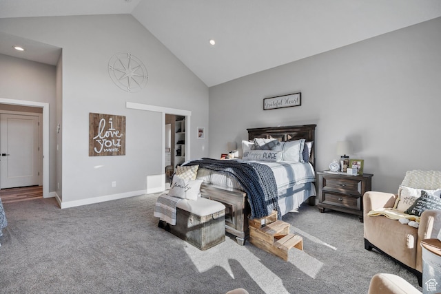 bedroom featuring carpet floors and high vaulted ceiling