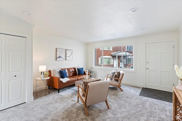 living room with light carpet and crown molding