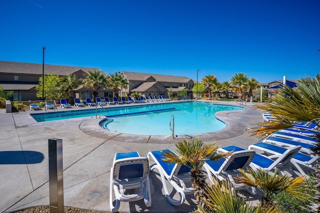 view of swimming pool featuring a patio
