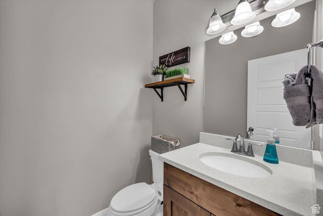1928 E Vacation Ln, Washington, UT 84780 - bathroom featuring vanity and toilet