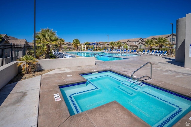 1928 E Vacation Ln, Washington, UT 84780 - view of swimming pool featuring a patio area