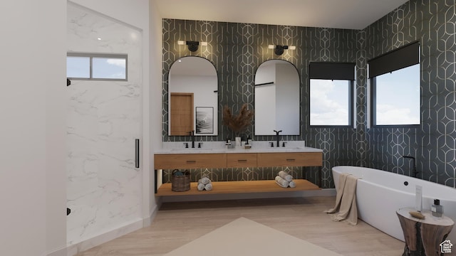 2114 S Pinto St Unit 76, Washington, UT 84780 - bathroom featuring vanity, wood-type flooring, a bath, and a wealth of natural light