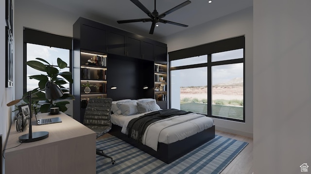 2114 S Pinto St Unit 76, Washington, UT 84780 - bedroom featuring light hardwood / wood-style floors and ceiling fan