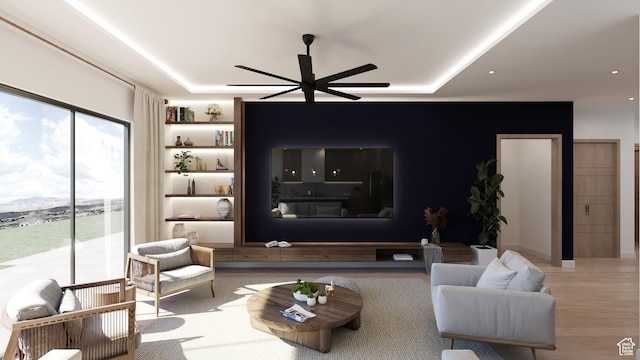 2114 S Pinto St Unit 76, Washington, UT 84780 - living room featuring ceiling fan, a raised ceiling, and light hardwood / wood-style flooring