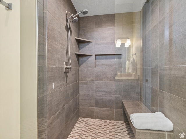 bathroom featuring tiled shower