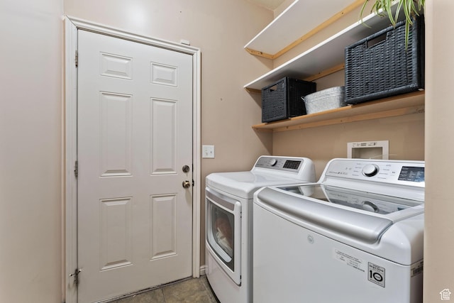 7112 N Mohican Dr E, Eagle Mountain, UT 84005 - clothes washing area featuring washer and clothes dryer and light tile patterned floors
