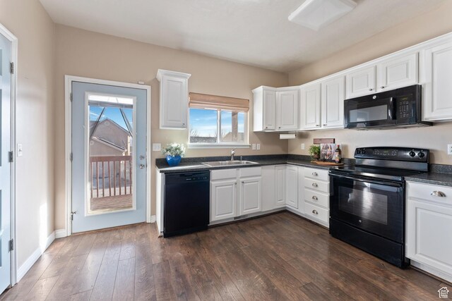 7112 N Mohican Dr E, Eagle Mountain, UT 84005 - kitchen with sink, white cabinetry, and black appliances
