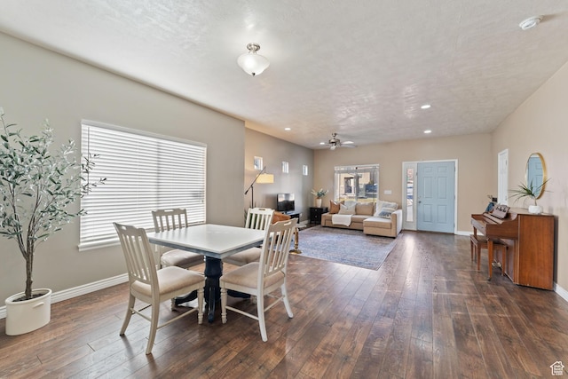 7112 N Mohican Dr E, Eagle Mountain, UT 84005 - dining room with a textured ceiling, ceiling fan, and dark wood-type flooring