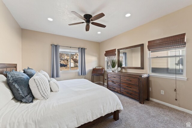 7112 N Mohican Dr E, Eagle Mountain, UT 84005 - bedroom with ceiling fan and light carpet
