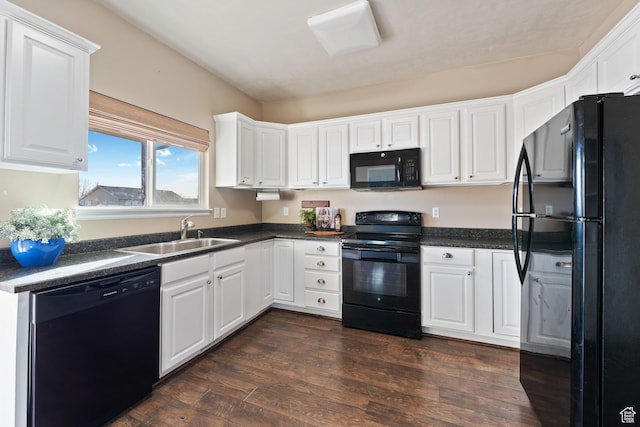 7112 N Mohican Dr E, Eagle Mountain, UT 84005 - kitchen with sink, white cabinets, black appliances, and dark hardwood / wood-style floors