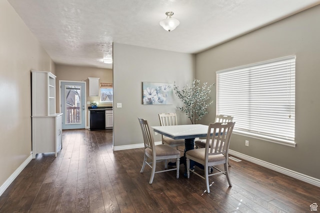 7112 N Mohican Dr E, Eagle Mountain, UT 84005 - dining space with dark wood-type flooring and a textured ceiling
