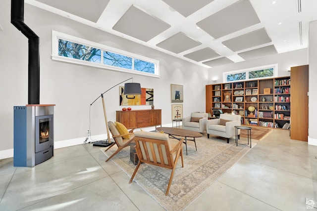 1762 E Millcreek Way, Millcreek, UT 84106 - living area featuring coffered ceiling, concrete flooring, plenty of natural light, a towering ceiling, and baseboards