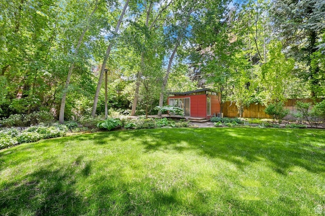 1762 E Millcreek Way, Millcreek, UT 84106 - view of yard featuring an outdoor structure and a shed