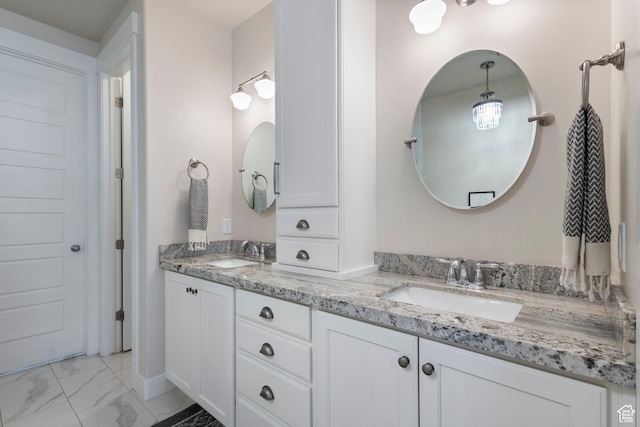 536 W Granite Cir, Saratoga Springs, UT 84045 - bathroom with double vanity, a sink, and marble finish floor