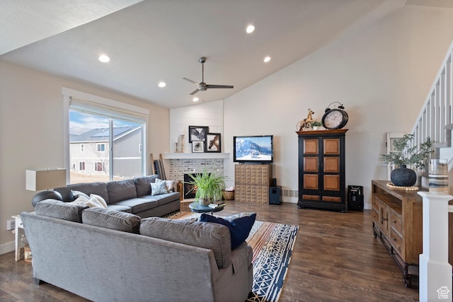 536 W Granite Cir, Saratoga Springs, UT 84045 - living room featuring a ceiling fan, a brick fireplace, baseboards, lofted ceiling, and dark wood-type flooring