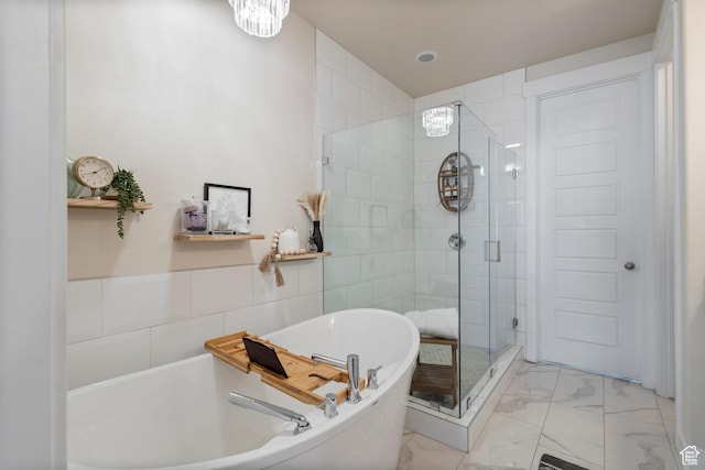 536 W Granite Cir, Saratoga Springs, UT 84045 - full bathroom with a freestanding tub, a shower stall, and marble finish floor