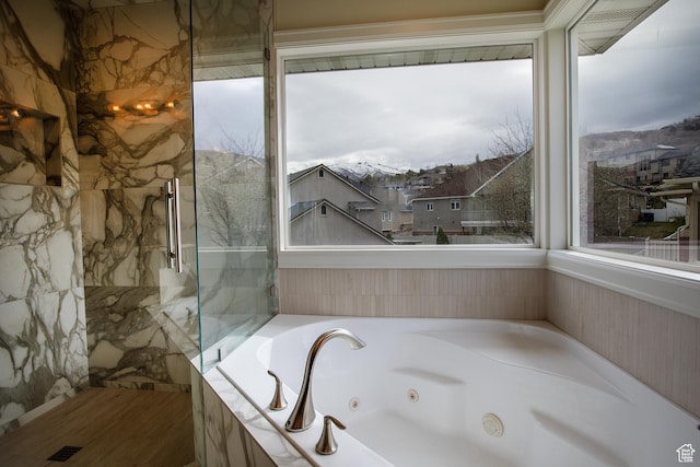 2783 S Irene Dr E, Bountiful, UT 84010 - full bathroom with a jetted tub, walk in shower, and a wealth of natural light