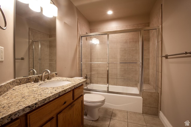 2783 S Irene Dr E, Bountiful, UT 84010 - full bathroom with tile patterned flooring, vanity, toilet, baseboards, and enclosed tub / shower combo