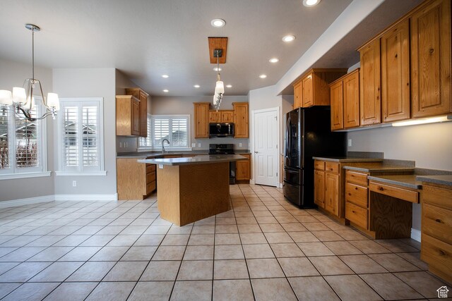 2783 S Irene Dr E, Bountiful, UT 84010 - kitchen with stainless steel microwave, electric range oven, a center island, light tile patterned floors, and recessed lighting