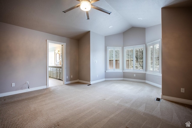 2783 S Irene Dr E, Bountiful, UT 84010 - spare room with light carpet, baseboards, vaulted ceiling, and ceiling fan
